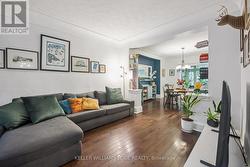 H/W flooring, recessed archway, cove ceiling - 