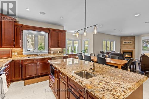 Cherry kitchen with Brazilian granite countertops - 758335 Girl Guide Road, Georgian Bluffs, ON 