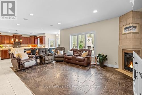 Open concept living with natural stone floors - 758335 Girl Guide Road, Georgian Bluffs, ON 