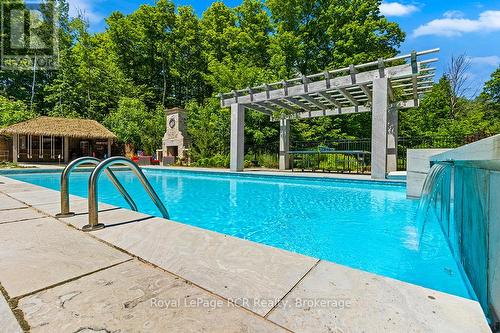 8 ft deep pool complete with waterfall. - 758335 Girl Guide Road, Georgian Bluffs, ON 