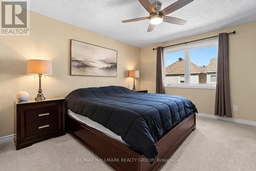 Bright primary bedroom with large window - 223 Serra Ridge, Ottawa, ON 