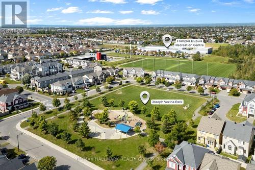 Aerial view of park, recreation centre and home - 223 Serra Ridge, Ottawa, ON 