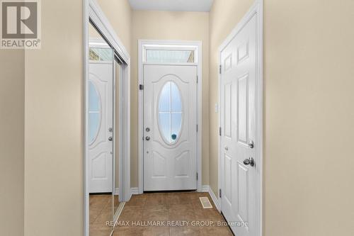 Bright front entry with hardwood flooring - 223 Serra Ridge, Ottawa, ON 