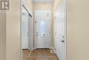 Bright front entry with hardwood flooring - 223 Serra Ridge, Ottawa, ON 