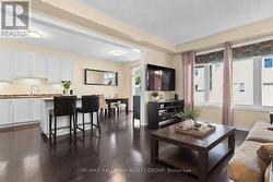 Open-concept living, dining and kitchen - 