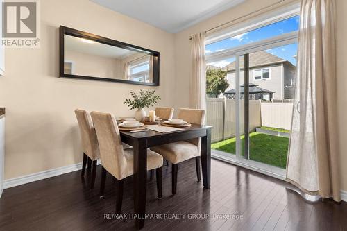 Dining area with sliding doors to backyard - 223 Serra Ridge, Ottawa, ON 