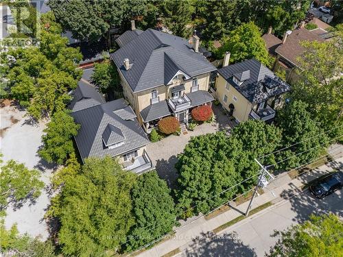 Multiple structures featuring dark metal roofing - 100 Brunswick Street, Stratford, ON 