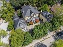 Multiple structures featuring dark metal roofing - 100 Brunswick Street, Stratford, ON 