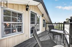 Deck with dark wood-finish flooring - 