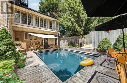 Backyard featuring a rectangular in-ground pool - 100 Brunswick Street, Stratford, ON 