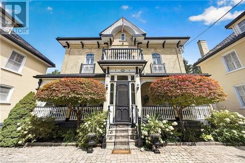 Brick exterior with decorative corbels - 100 Brunswick Street, Stratford, ON 