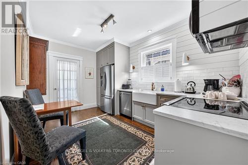 White shaker cabinetry and subway tile backsplash - 100 Brunswick Street, Stratford, ON 