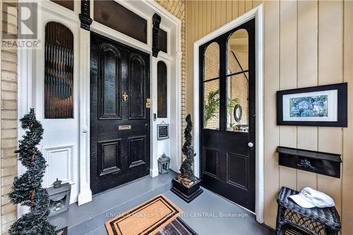 Exterior entryway with a paneled door - 100 Brunswick Street, Stratford, ON 