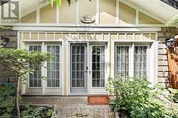 Facade featuring multiple transom windows - 