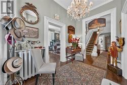 Hardwood flooring and a crystal chandelier - 