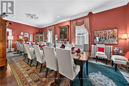 Formal dining room featuring wood-finish flooring - 100 Brunswick Street, Stratford, ON 