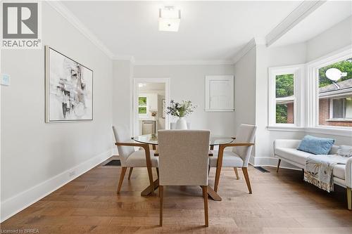 Expansive wood-finish flooring throughout - 87 Strathcona Avenue, Brantford, ON 
