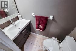 Built-in vanity with integrated sink, chrome faucet, and storage drawers - 