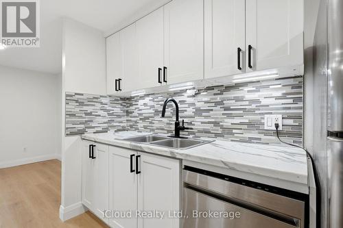 Updated kitchen with new cabinets - 3 Manley Crescent, Thorold, ON 