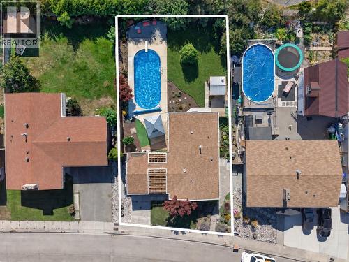 Digitally Altered- pool liner to be replaced asap and grass under repair - 1261 Lawson Avenue, Kelowna, BC 