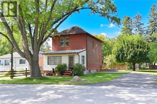 Brick exterior with white siding accents - 781 Oakdale Avenue, Burlington, ON 