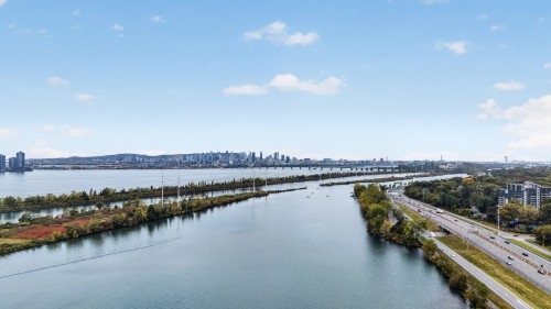 Vue sur l'eau - 107-5730 Boul. Marie-Victorin, Brossard, QC 