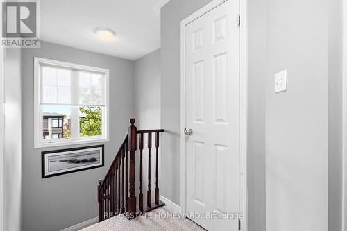 Hallway and stairs to second level - 10 - 571 Longworth Avenue E, Clarington, ON 