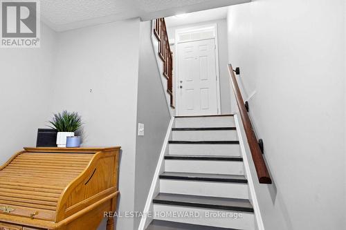 Ground floor Hallway and stairs to Living Room - 10 - 571 Longworth Avenue E, Clarington, ON 