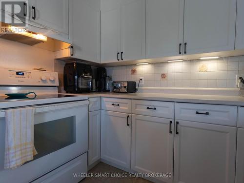Newer white cupboards and under mount lighting - 78 Maple Street, South Stormont, ON 