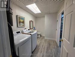 Basement Laundry room combined with two piece bath - 