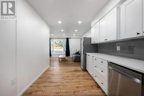 Kitchen through to the front window - 139 Town Line, Orangeville, ON 