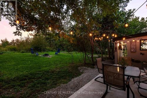 Patio looking out to the yard - 139 Town Line, Orangeville, ON 