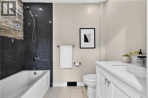 White vanity with integrated sink, chrome hardware, and a single-handle faucet - 176 Avalon Place, Kitchener, ON 