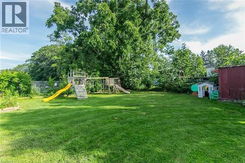 Expansive grassy yard with mature trees - 393 Huron Street, New Hamburg, ON 