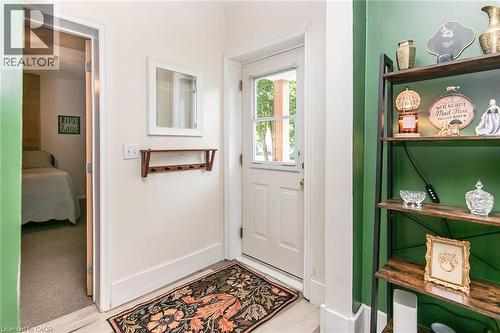 White painted entry door with window pane - 393 Huron Street, New Hamburg, ON 