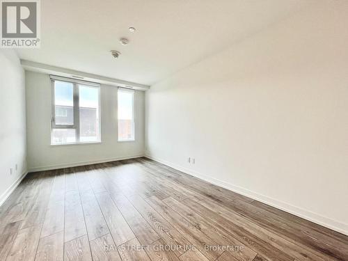 209 - 11 MARYPORT AVENUE , Toronto, Ontario M3M 0E2 4