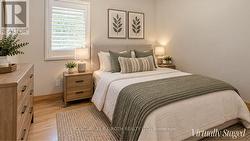 Virtually staged secondary bedroom - 