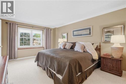 Wall-to-wall carpeting, crown molding, and a double window with sills - 5 Michelle Drive, St. Catharines, ON 