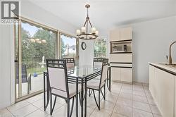 Sliding glass doors provide access to an outdoor deck - 