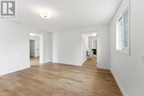 16B Living Room overlooking shared laundry - 16 Store Street, Prince Edward County (Hillier Ward), ON 