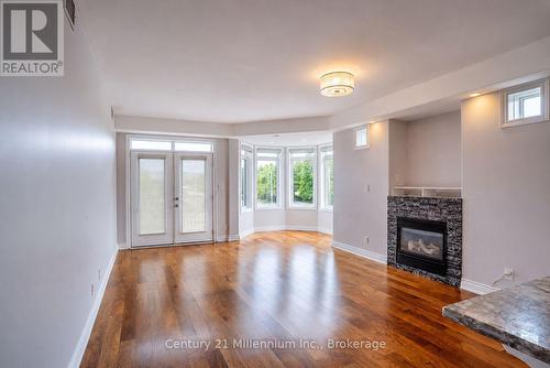 Great room with dining space and gas fireplace - 407 - 10 Bay Street E, Blue Mountains, ON 