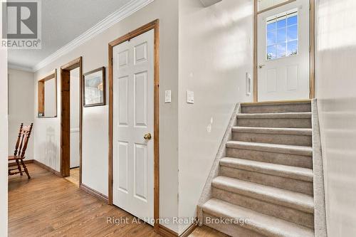 Front door with steps leading into unit - C - 103 Rita Crescent, Kawartha Lakes (Omemee), ON 