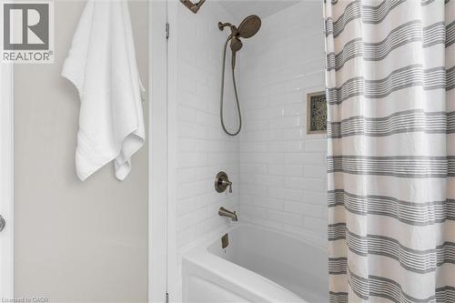 Bathroom with shower / tub combo with curtain - 5 Viking Court Unit# 301, Grimsby, ON 