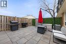 Fenced backyard with a patio area and a grill - 5 Viking Court Unit# 301, Grimsby, ON 