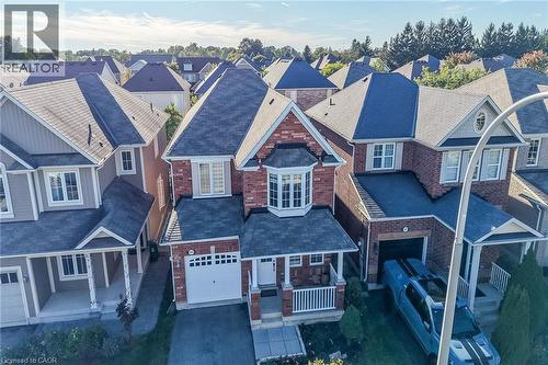 Red brick facade with stone accents - 103 Emick Drive, Ancaster, ON 