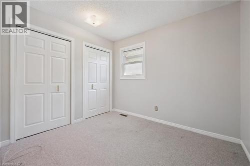 Neutral-toned walls complement light-colored carpeting - 512 Thorndale Drive, Waterloo, ON 