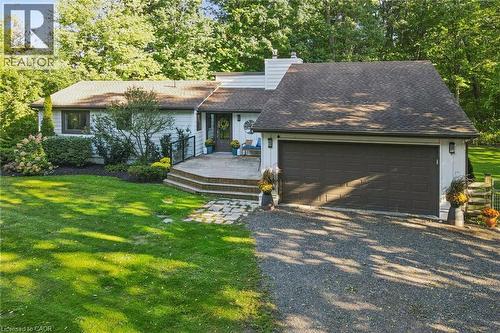 White exterior with a dark asphalt shingle roof - 282 Concession Rd 2, Scotland, ON 