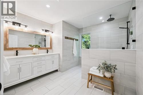 Dual vanity with white cabinetry and matte black faucets - 282 Concession Rd 2, Scotland, ON 