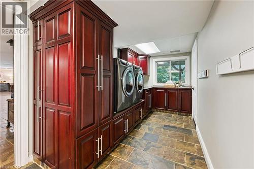 Custom built-in cabinetry, durable tile flooring, recessed lighting, and a large window - 282 Concession Rd 2, Scotland, ON 