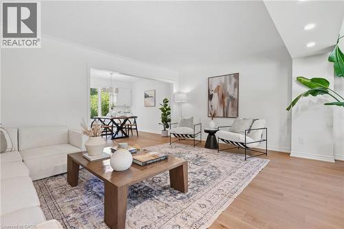 Recessed lighting, crown molding, and wood-finish flooring - 4159 Spruce Avenue, Burlington, ON 